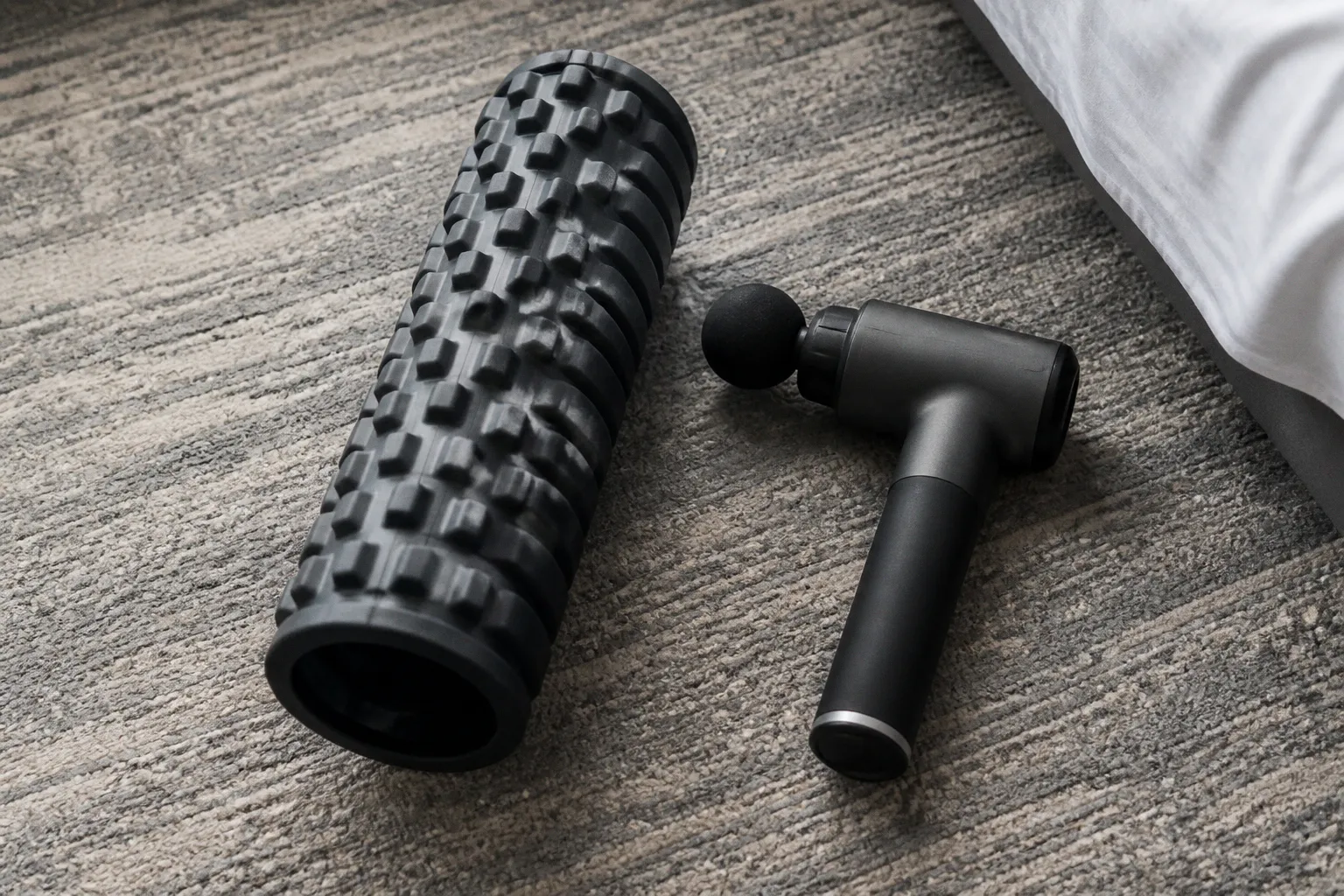 Foam Roller vs Massage Gun: Travel Recovery Tools