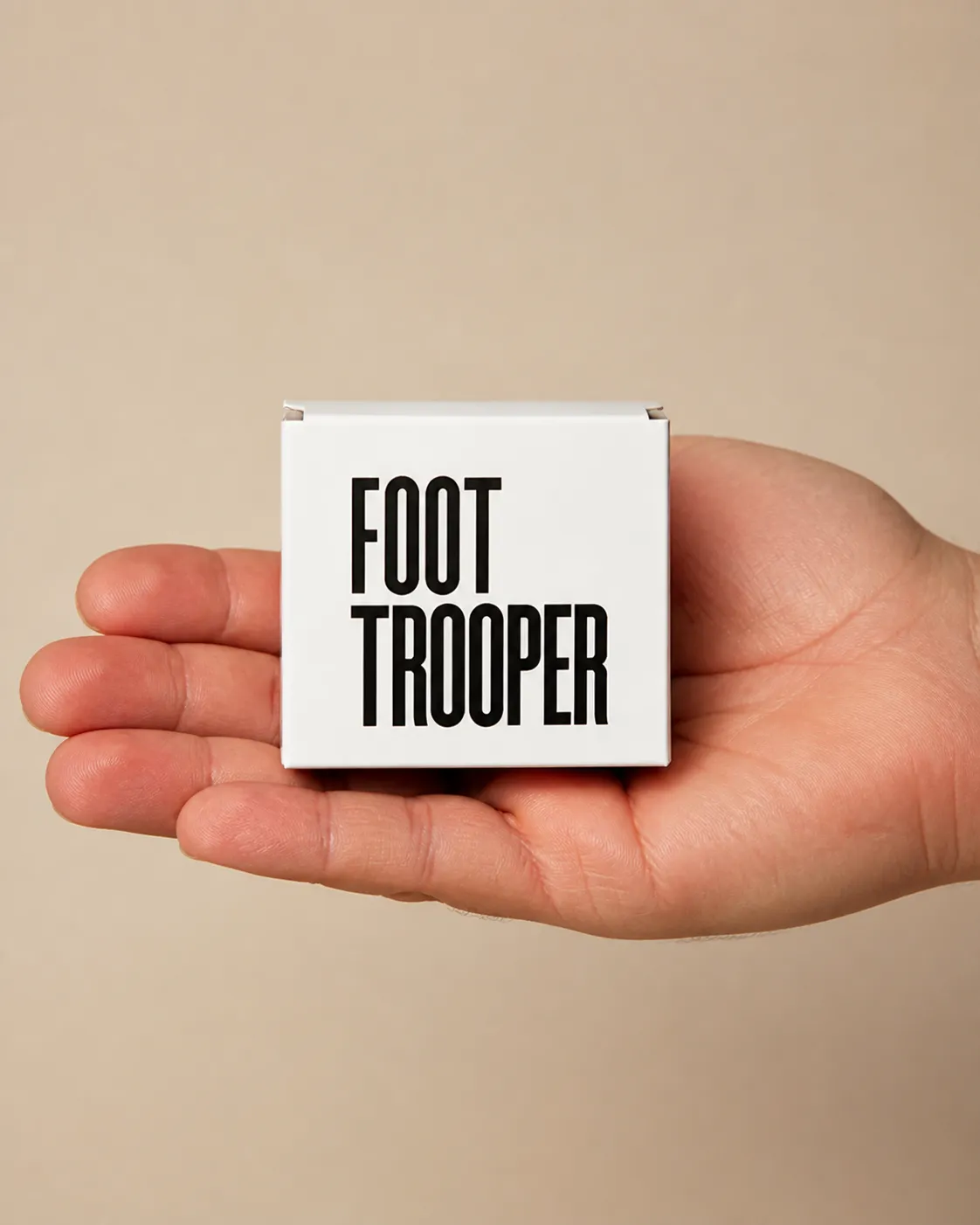 Foot Trooper — the package held in a hand