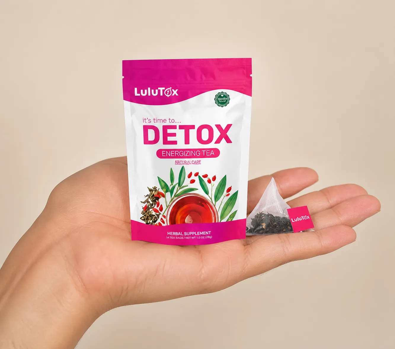 Lulutox Detox Tea — the package held in a hand